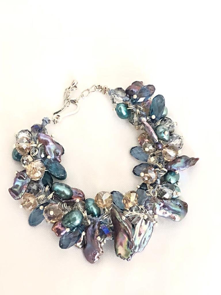 Excited to share this item from my #etsy shop: Dangling Freshwater Cultured  Pearl and crystals charm bracelet #jewelry #bracelet #blue #charm #bridal #weddings #charmbracelet #pearlbracelet #fashion #giftfirher etsy.me/30Bq6NT