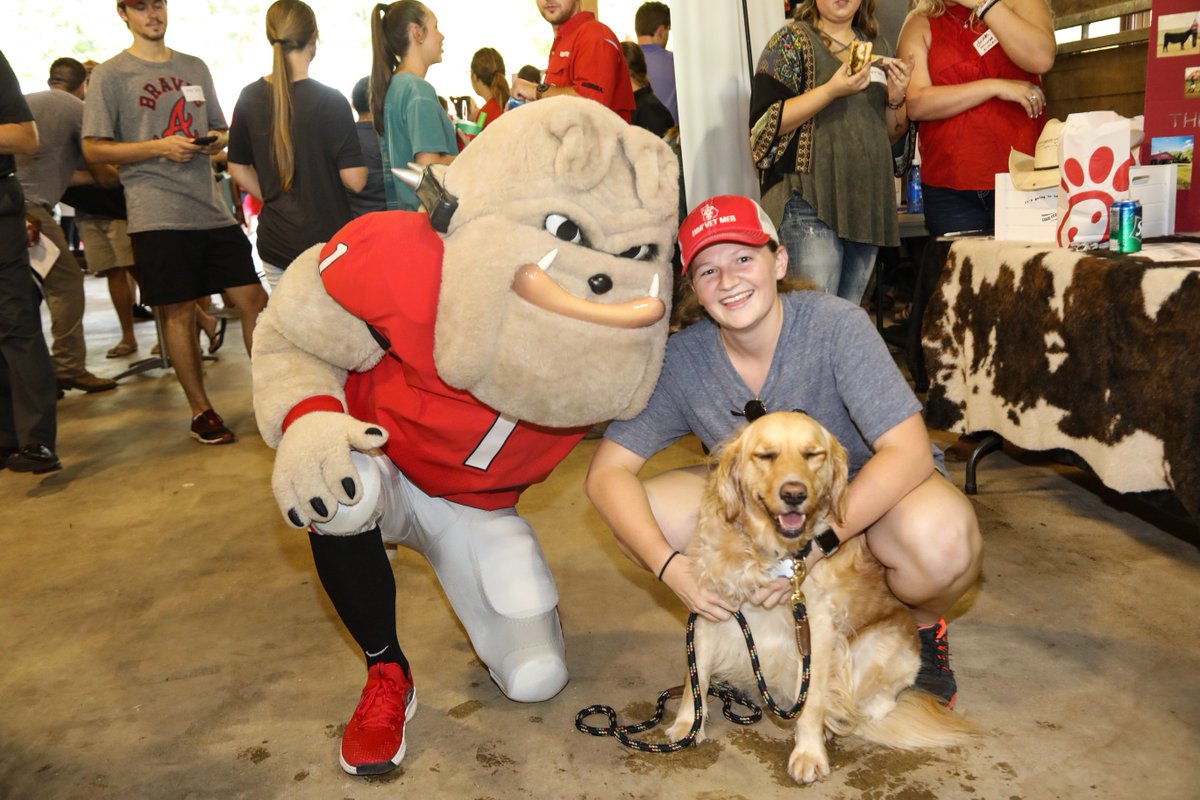 UGA_CAES_Alumni's tweet photo. Just a Dawg hanging out with an #AgDawg and her dog. #NationalDogDay #NationalDawgDay @ugaalumniassoc @UGA_CollegeofAg https://t.co/62zoyGxucm