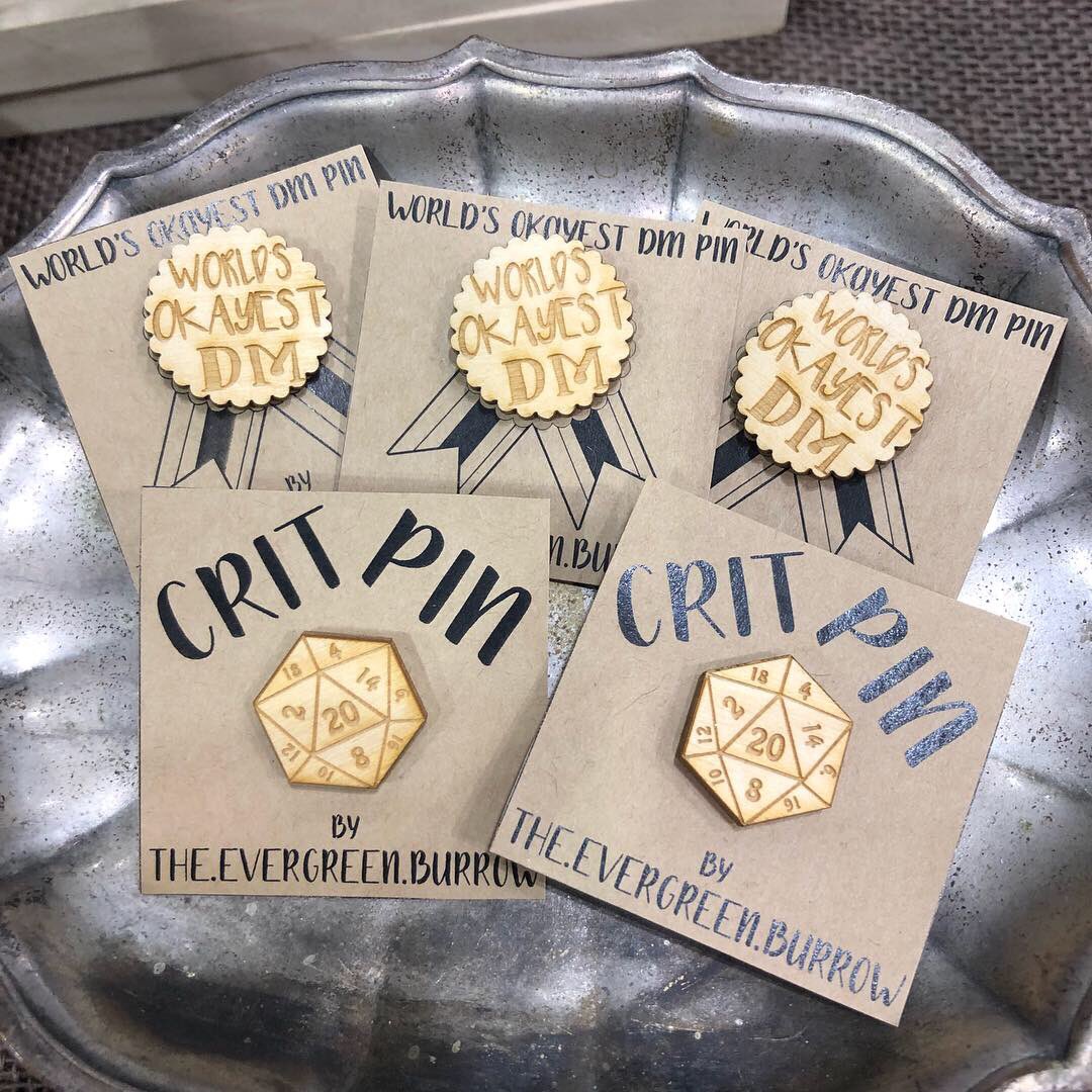 evergreenburrow's tweet photo. For this year, we have expanded our World’s Okayest DnD pin line to include all classes! Wooden pins are designed and assembled by hand, and are the perfect party gift 💕✨
#dnd #dragoncon #dragoncon2019 #ttrpg #worldsokayestdm https://t.co/3hiimIy5UQ