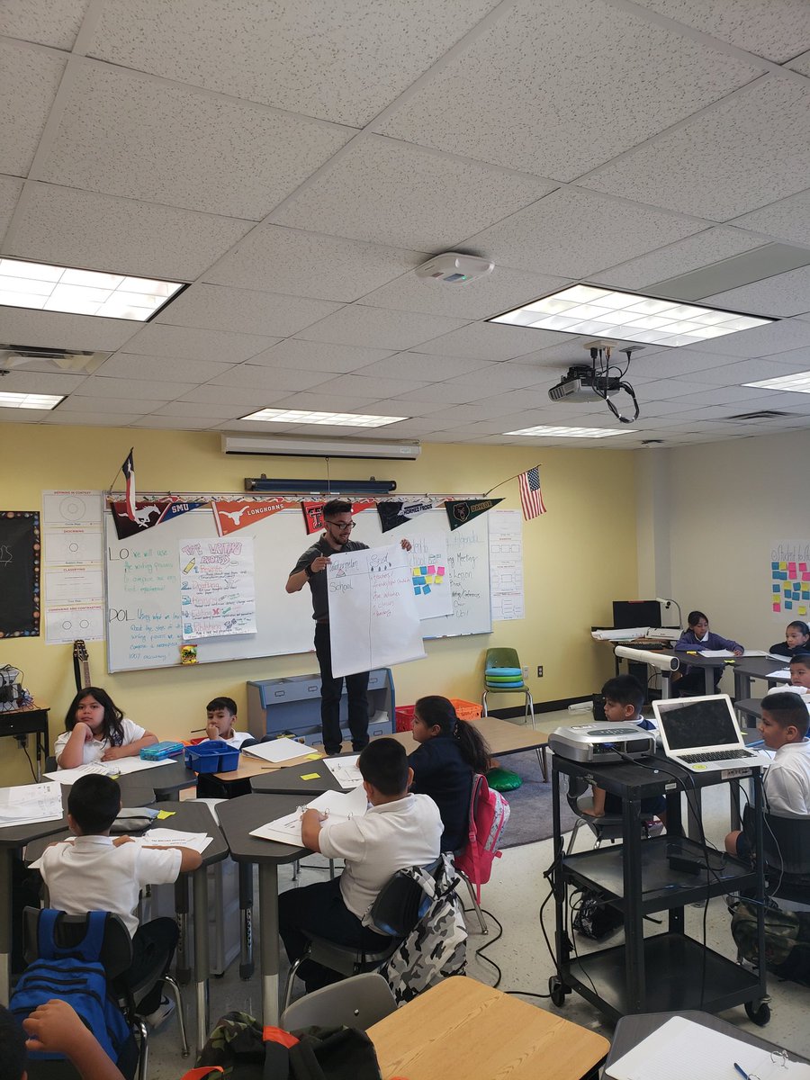 ebsamuel18's tweet photo. Look at @Mr_Arlo_Pez keeping the kids attention. Teaching on tables @CowartDISD https://t.co/qxN2dqkXJS