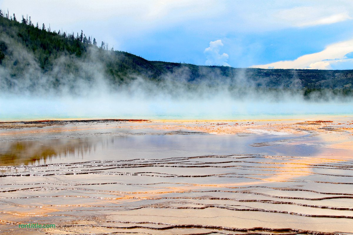 Grand Prismatic: While the Old Faithful geyser may be more famous, the Grand Prismatic Hot Spring is the most photographed thermal feature in Yellowstone. It has unique colors combined with its own steam clouds over a large area. (More on my blog at rontittle.com)