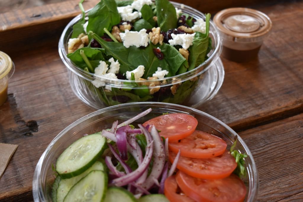 sundevich's tweet photo. Soon the salads and smoothies will turn into soups and hot ciders.  Get your favorite sandwich on top of any one our salads.  Pictured is our spinach salad with dried cherries, walnuts, goat cheese and balsamic vinaigrette and our house salad.  #SUNdeSALAD https://t.co/zfinKXEFo3