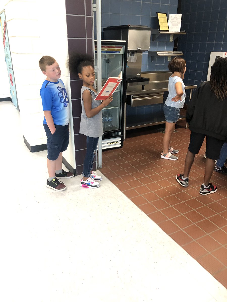 At Hughes we’re always reading! This fourth grade friend was caught reading today in the lunch line! @Hughes_Hawks #readingiseverywhere #becaseweloveit