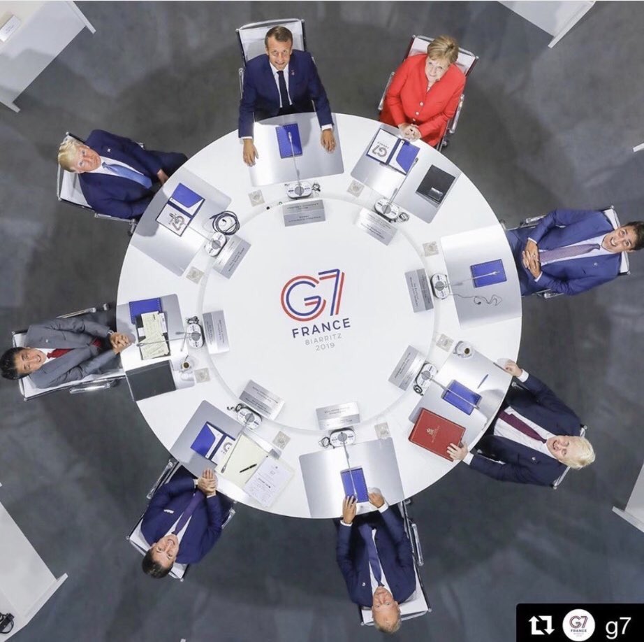 ThamarXOttens's tweet photo. Aurora’s abode is the #sky. What are the participants of the #SummitG7 looking at here? Right...the SKY! Forming a Q sitting at the round ⭕️ table. How cool is that? There’s also a Q in front of Trump btw #Qanon #dawn #TheGreatAwakening #WWG1WGA #purple #cloak https://t.co/DWxxgP3IEb