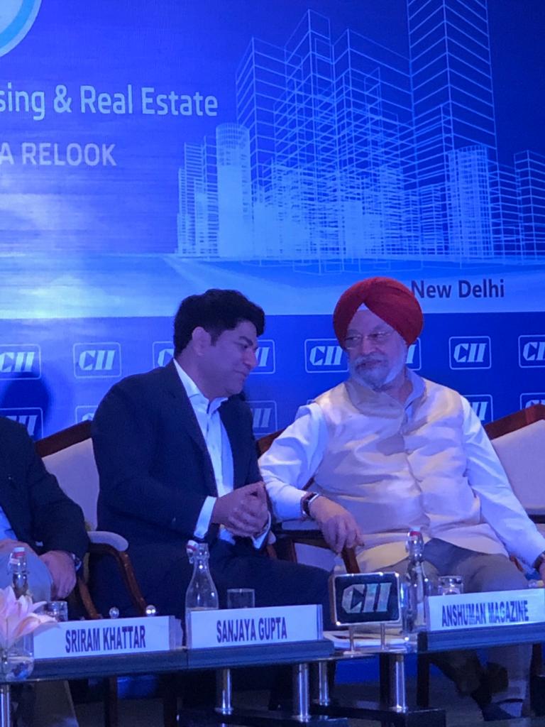 CBRE_India's tweet photo. @AnshumanMagzine in a candid conversation with @HardeepSPuri, Hon'ble Minister of State for Housing & Urban Affairs during the inaugural session of #CIIRealty2019
#CBRELive #CIIRealty2019 #CIIXCBRE @CIIEvents @MoHUA_India https://t.co/yfx7q9XXrn