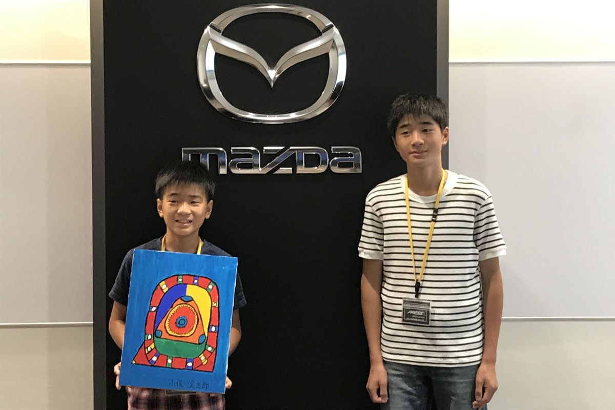 MZRacing's tweet photo. ロータリーファンの皆さん、「RE好き少年新聞記者、マツダを訪問」記事をMZRウェブに公開しました。とっても面白い内容なので、是非拡散をお願いします。ハッシュタグは #REboy です。少年自作のREキーホルダーも買ってあげくださいね。 >>> https://t.co/3SI9aqoK6N https://t.co/gXZmtLmCGU