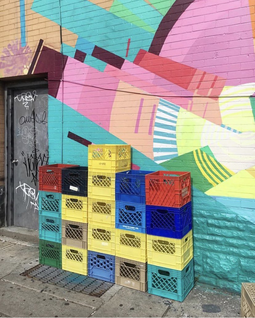 Lots of colour in #Bloordale! We love the new mural that @jacquiecomrie did during @bigonbloorfest and how the colourful milk crates just sort of blend right in here! ❤️🧡💛💚💙💜 📷 by @home_co on IG