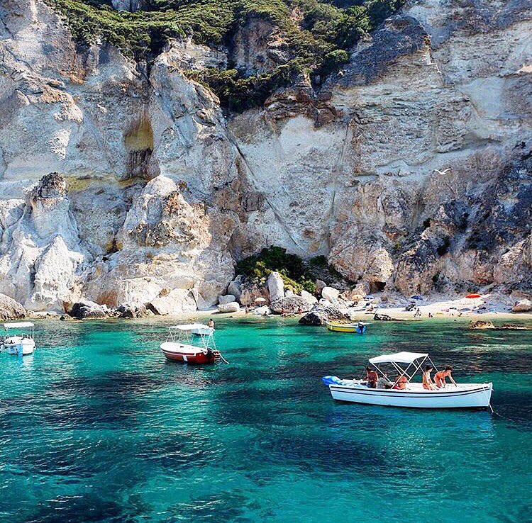 nalexanderswim's tweet photo. It’s hard to find a pocket of Italy that isn’t crawling with tourists. Enter Ponza off the coast of Lazio, this “not so talked about” gem is littered with spectacular turquoise coves just like this one. 
#nicolasalexanderswimwear #tailoredforthesun https://t.co/6gOIQOkNVi