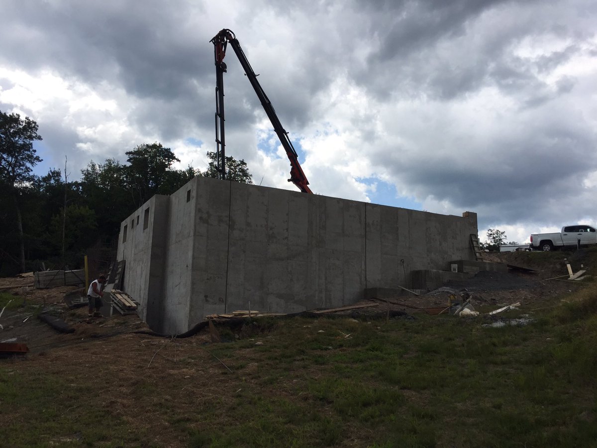 MuckTape's tweet photo. More progress on the tannersville townhouse project! 20’ high concrete walls to bring it above ground! #joezelenack https://t.co/6d8bEVhbXM