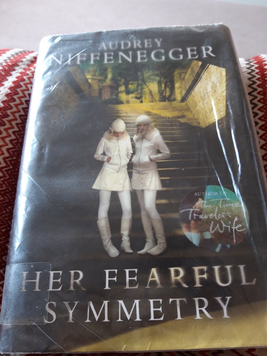 mummylikes2read's tweet photo. How I am surviving the summer holiday is by becoming fully engrossed in #HerFearfulSymmetry thanks @AANiffenegger... who knows what the kids are doing. #summerreading #librarybook #ghoststories #survivingsummer https://t.co/E67qII2RtE