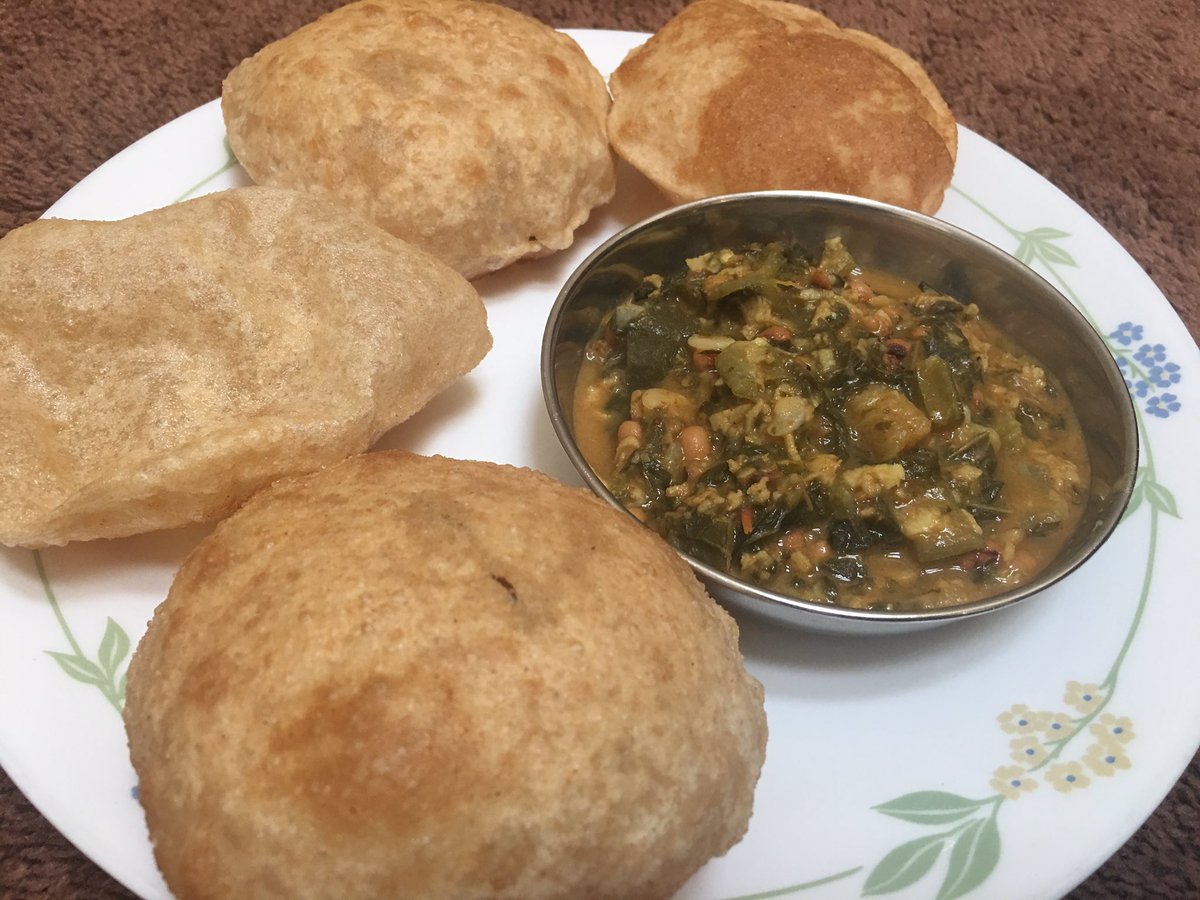  @pedestrianwoman look what you made me do .. Poori (made in a hurry out of chapati ka atta) with left over Pundi Palya/ Gongura & chori subzi.. now I am left craving for some mithai.