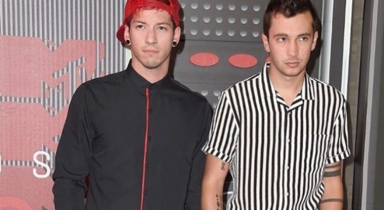 imnotwilling's tweet photo. @tylerrjoseph uh oh. you have some competition. however, i really think the individual on the right presented the outfit amazingly. https://t.co/mYNmhv1bVI