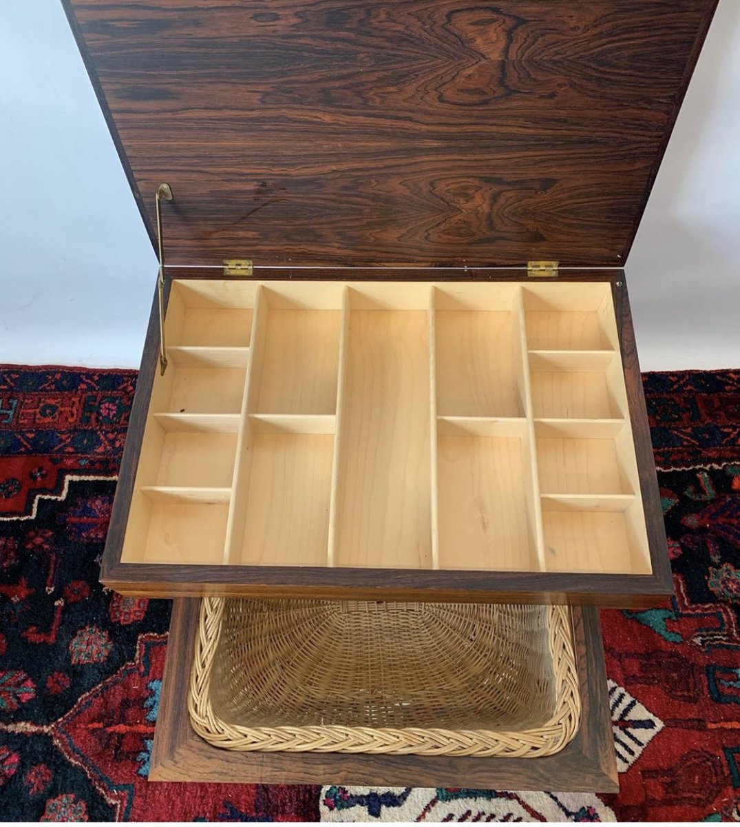 PeriodModern's tweet photo. Available: Wonderful Rosewood Sewing Table by Ejvind Johansson circa 1960s. The top opens up to interior compartmentalized storage, while the lower shelf allows access to a built-in basket. Unique option for a cabinet, bedside table or jewelry storage. #ejvindjohansson #sewing https://t.co/HgCLsI8PpT
