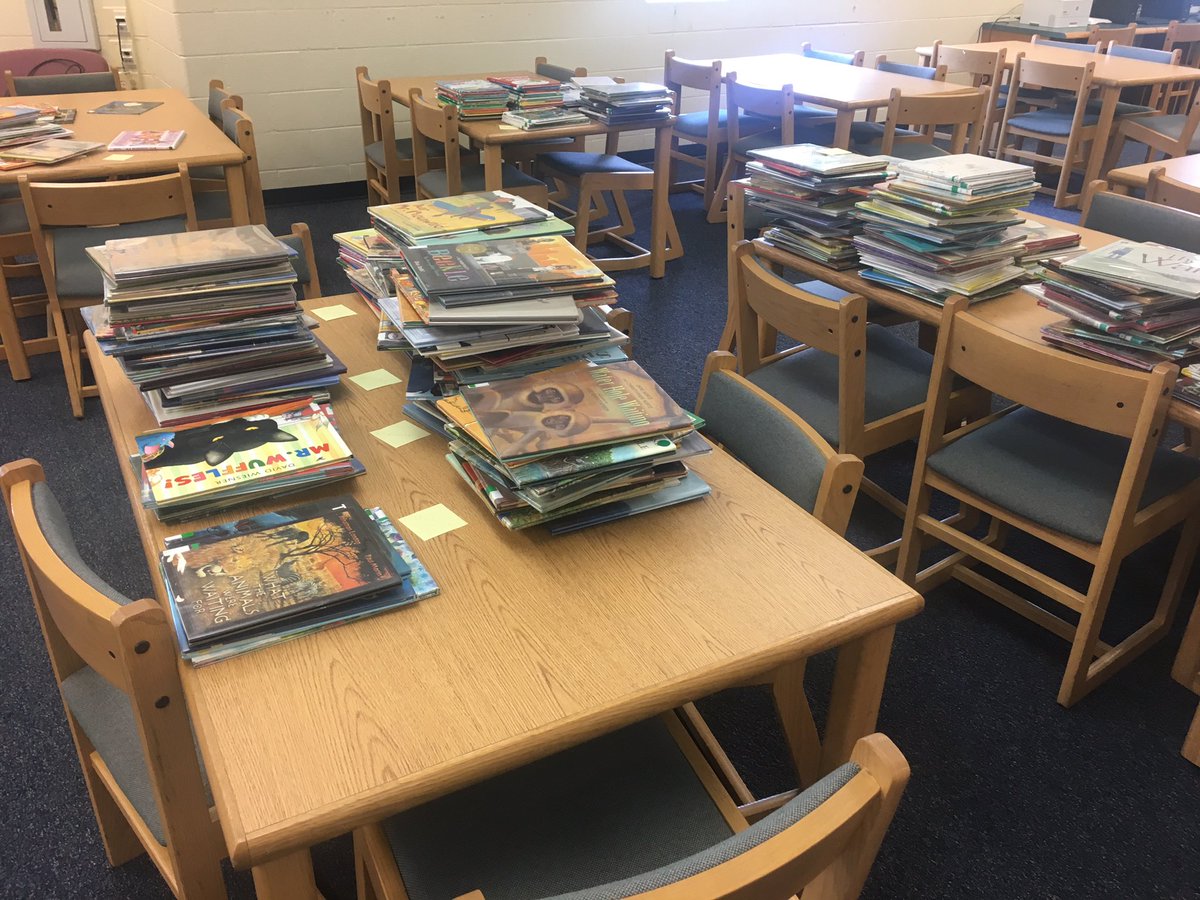 malnsol's tweet photo. Tearing up the picture book section @GlasgowMS to increase circulation and make it user-friendly! #stacksfordays Can’t wait to reveal my final projects! #GMSbelieves https://t.co/hzcZ2fpepB
