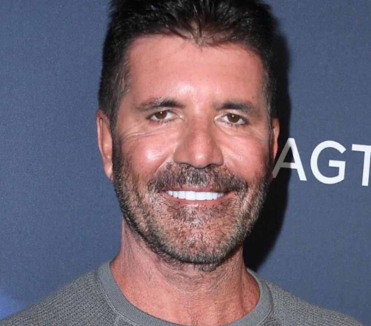 "The teeth, doctor. They're too white. It's just too all too bright and smiley." 
"OK. Shall I take them down a bit?" 
"No, too late. Make my eyes sad. That'll balance things out." 
"Um...OK."