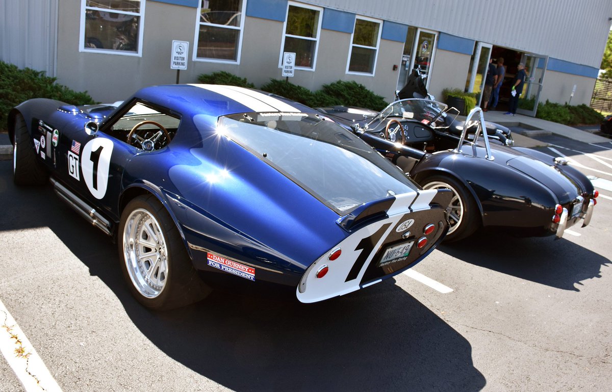 FactoryFive's tweet photo. We've got the big rig loaded, and we're about to head up to Foxboro, MA for this afternoon's Cruise-In. We're bringing our #Mk4 #Roadster, the famous Mk4 Half Mobile, the new 2nd Gen #HotRod, '35 #HotRodTruck, #Type65Coupe, and #818C. If you're in the area, come join us! https://t.co/eSIfX0rBNL