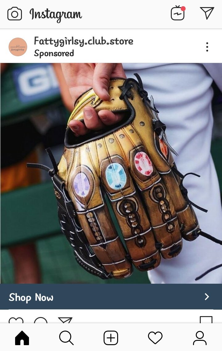 ADriftingNerd's tweet photo. How to make @RevEnFuego a baseball fan. #InfinityGlove @BJandMigs @999KISW @BJShea @ImSteveMigs (screenshot via IG Ad) https://t.co/C79cOwdwRd