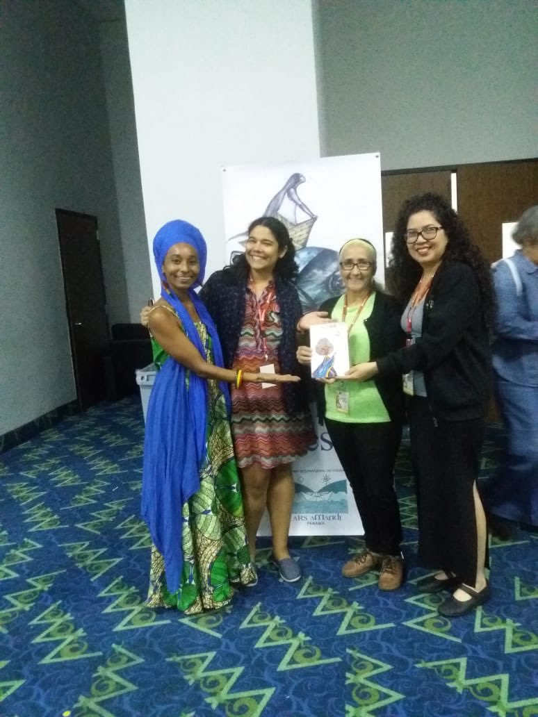 soulfulafro's tweet photo. Mi querida hermana amiga Fyah Love representando mi libro #NubianButterfly en la Feria de Libro y hoy Feria de la #Poesia en #Panama. #poetas #OrgulloColonense https://t.co/db9jlw9Aby