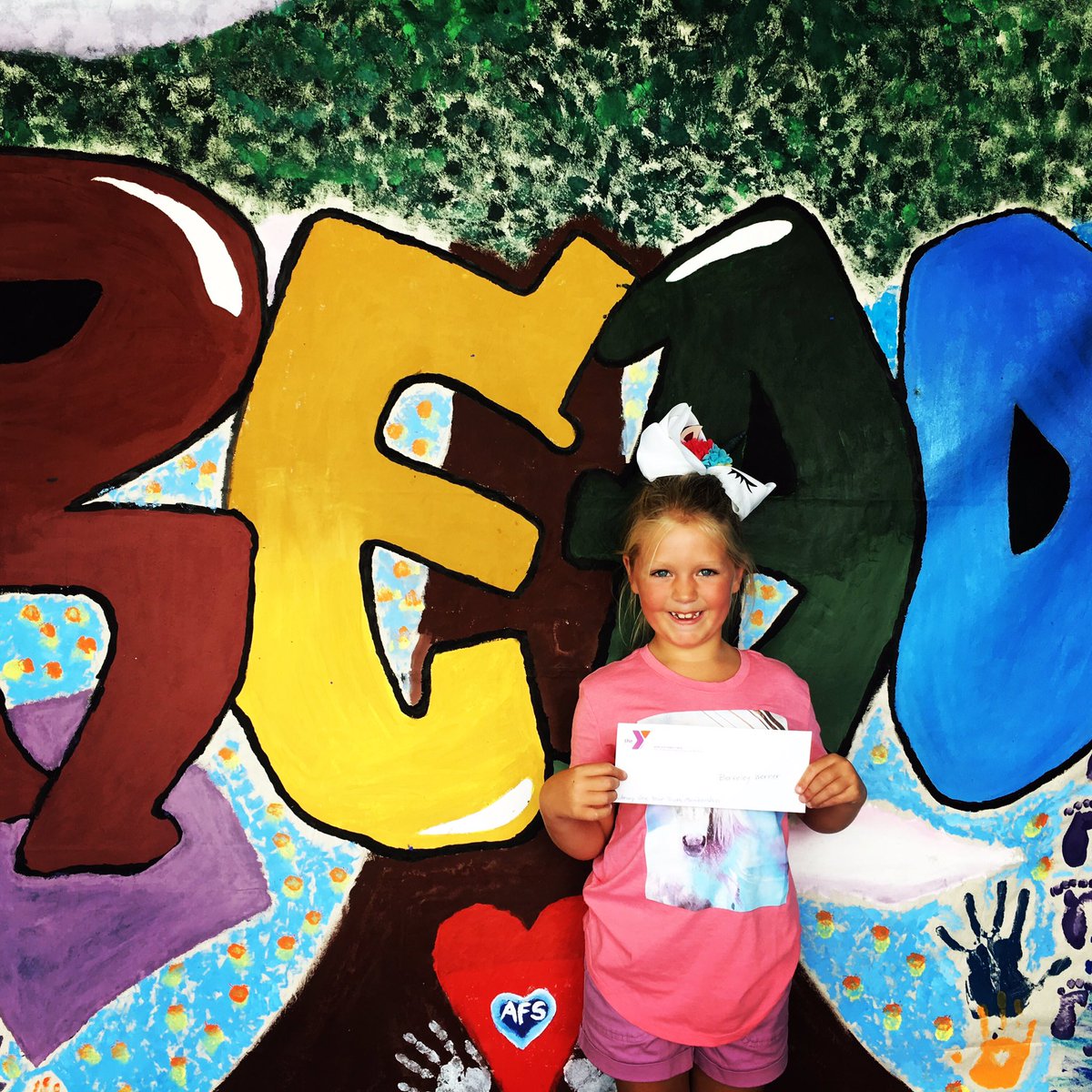 This lucky girl won a year membership to the YMCA for completing the summer reading program at the public library. #readingrocks <a href="/ymca/">ymca</a>