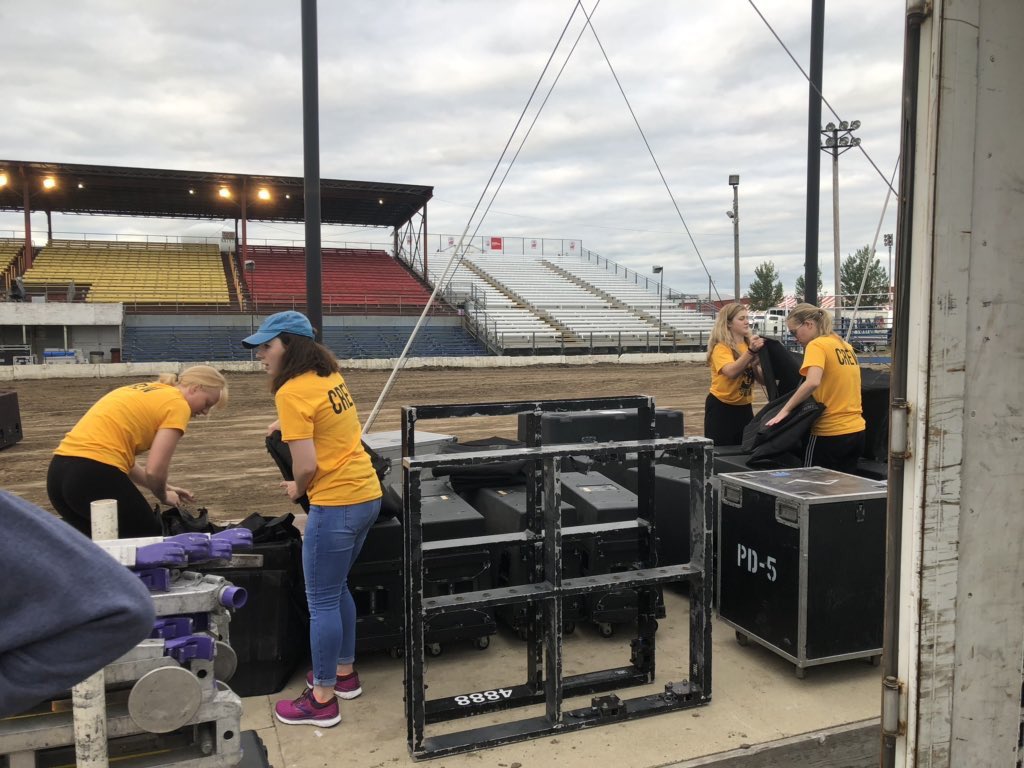 CoachMonanian's tweet photo. #BCF19 Night 2️⃣: Our swimmers are working hard rain or shine to get the stage ready for tonight! @JordanDavisPoet @DylanScottCntry #goWOLVES https://t.co/fekWX3cNFy