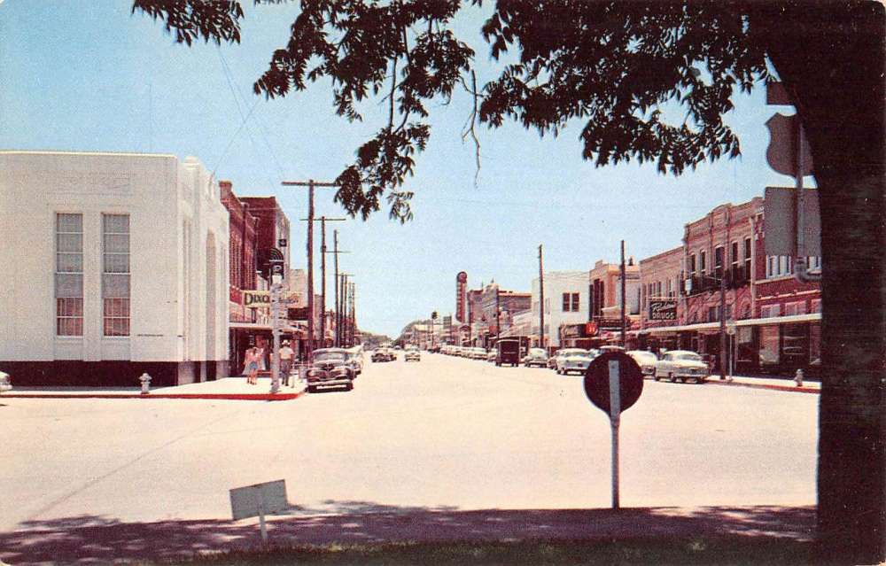 Even back then the downtown New Braunfels scene was full of Texas history. Can you guess what year this postcard is from?