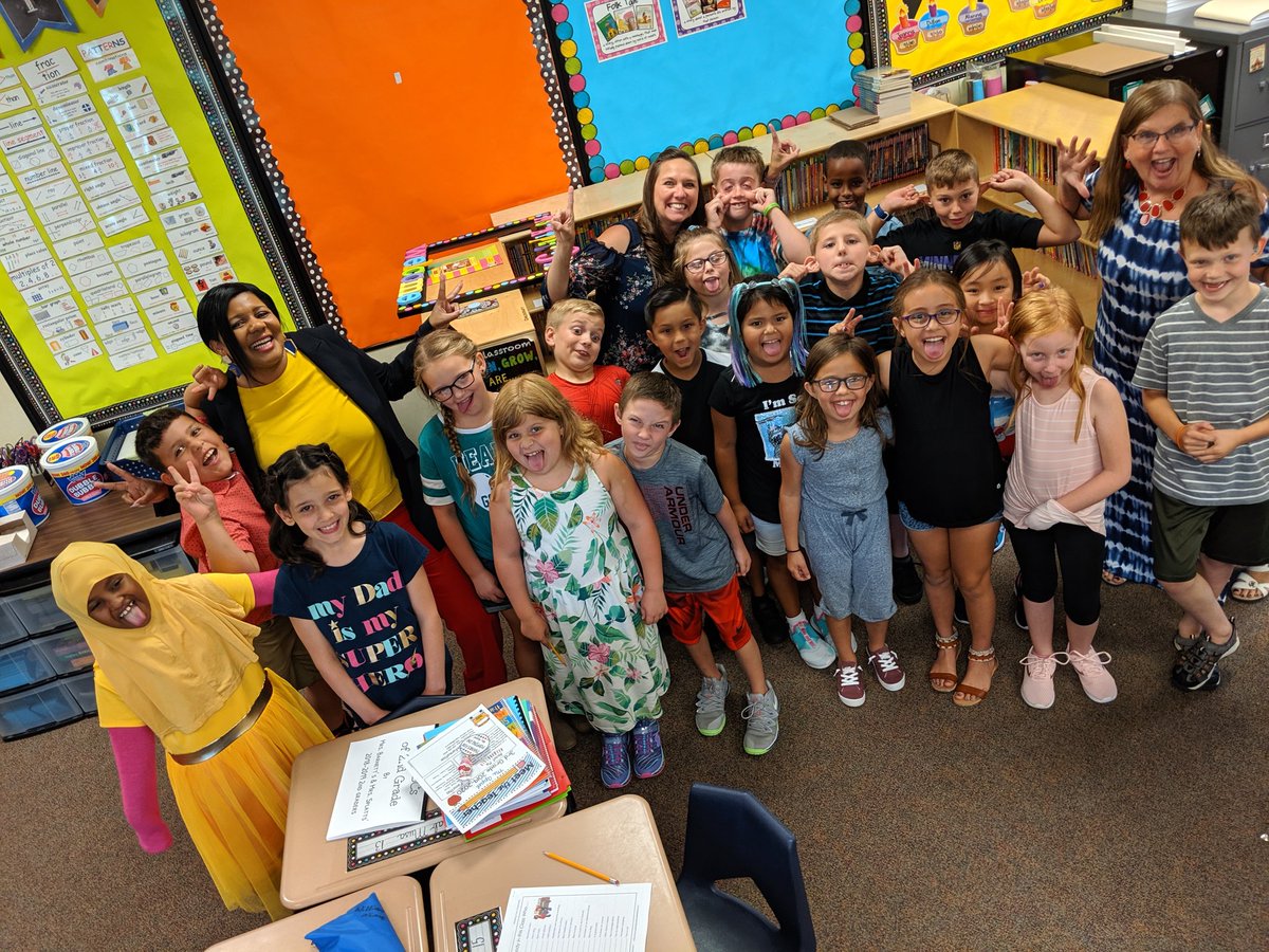 GIPublicSchools's tweet photo. At @NewellGI today, @DrTGrover was framed! #GIPSfirstdayeveryday https://t.co/T5zdvYUf3V