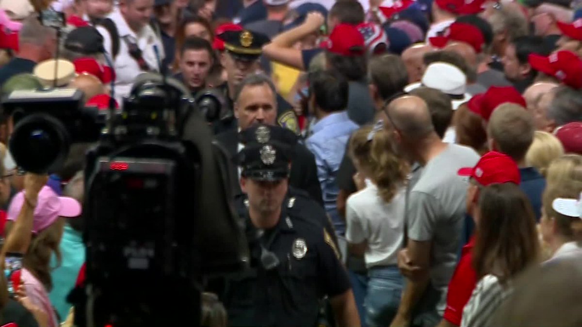 WCVB's tweet image. Brief pause from @RealDonaldTrump at #TrumpinNH rally for police, paramedics to assist woman who appeared to have some kind of medical emergency.