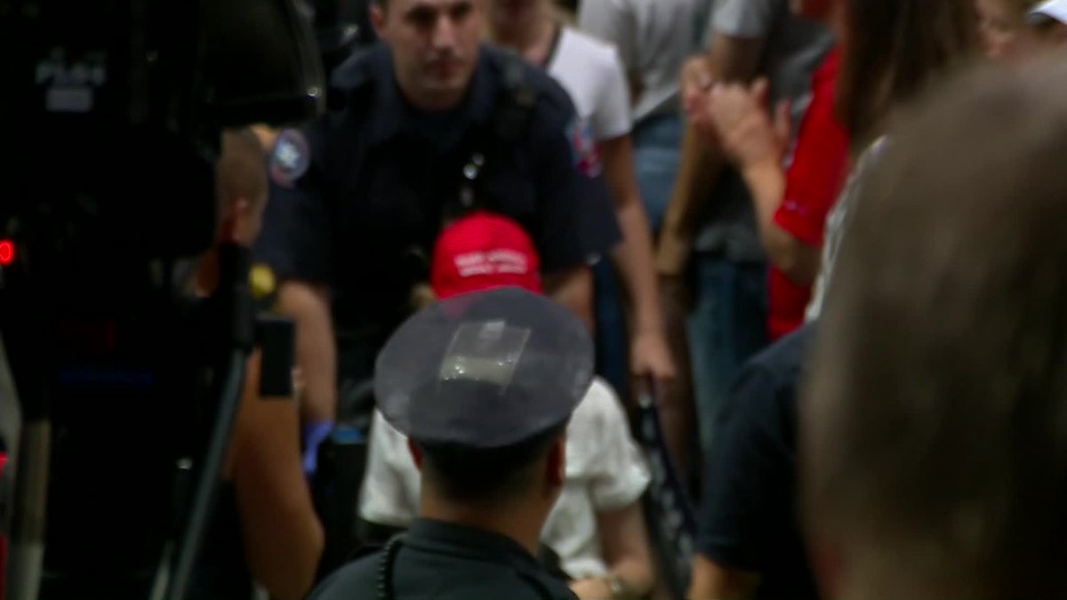 WCVB's tweet image. Brief pause from @RealDonaldTrump at #TrumpinNH rally for police, paramedics to assist woman who appeared to have some kind of medical emergency.