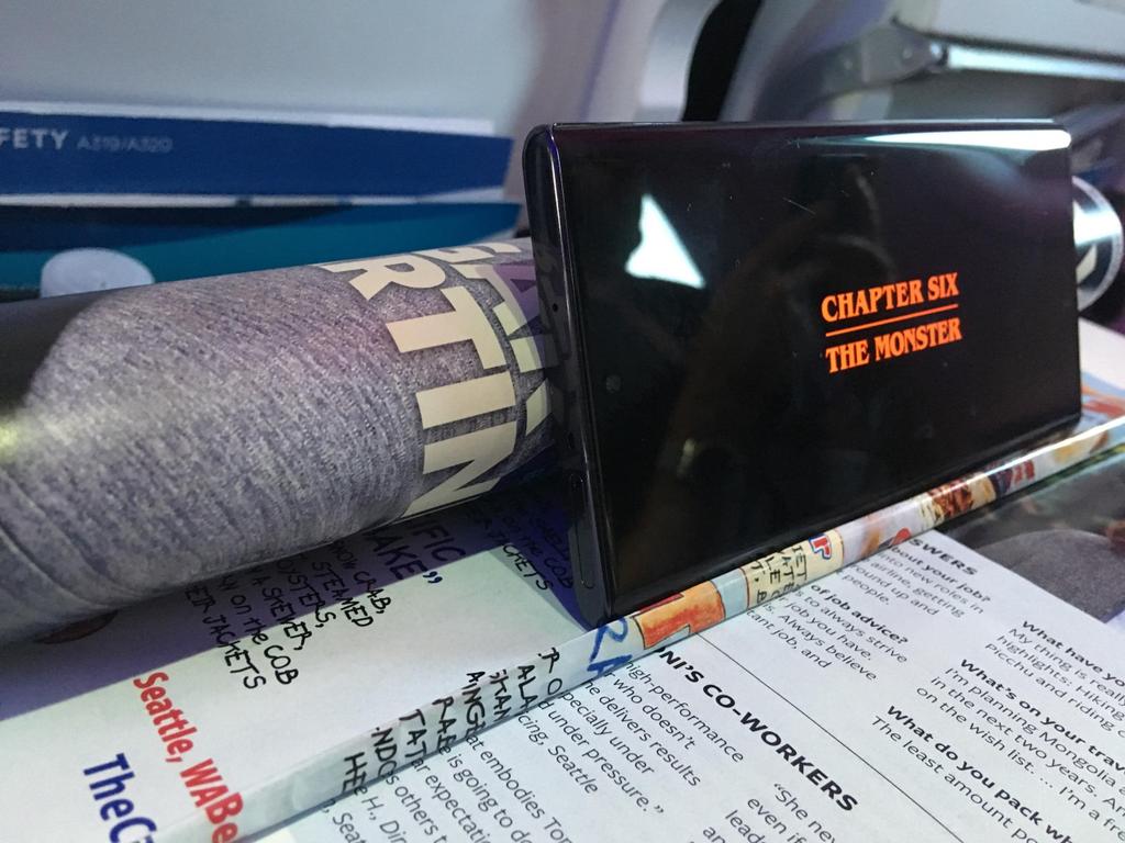 Casey's tweet photo. check out this perfectly functional phone holder I made by creatively folding the in-flight magazine. 

have a great night everyone. https://t.co/vest2gHfuY