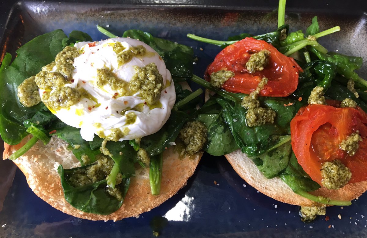 How do you like yours in the morning? We recommend poached with harissa roasted tomatoes with spinach and bagels.
