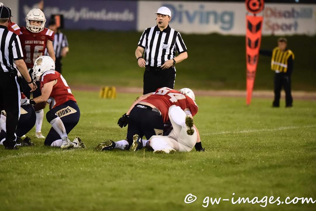 The fantastic Aimee Cottingham doing what she does best (at the IFAF Women's European Championships for Great Britain, Wednesday night against Austria). #SeekAndDestroy. #64. #DL. #TANC. Images, with thanks, copyright, gw-images.com.