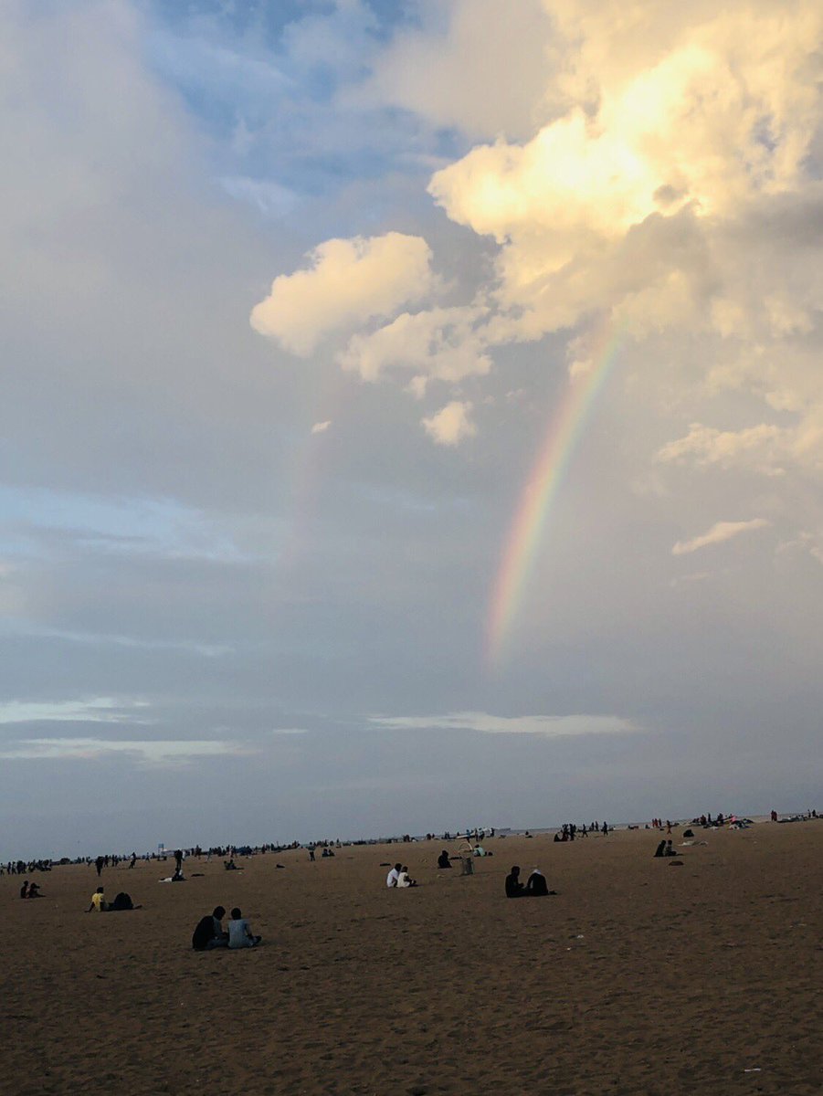 BeachNamitha's tweet photo. Some see the rainbows in the sky, some see the cosying couples on the sand. #perspective #marinabeach #see #unsee #nammachennai #rainbow #couples https://t.co/8aKCd382pT