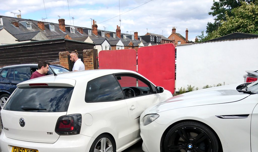 Runtymouse's tweet image. How do you manage to hit a car that is  blocking the road in front of you, and is most of the way through a 3 point turn (hence it being horizontal) , on a 20 mph residential road, with speed bumps, and not be able to brake in time to avoid smashing the door in?