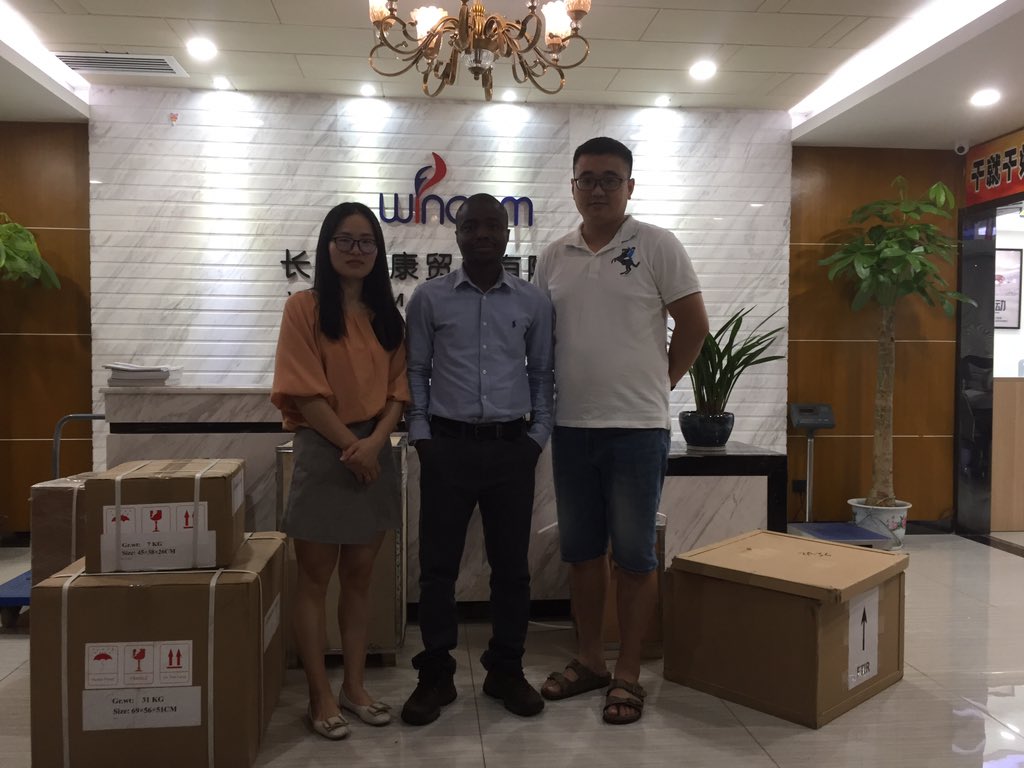 I visited this company based in Changsha, China today to conclude talks on laboratory and medical equipment supply. What can you observe from the first picture i.e staff group picture?