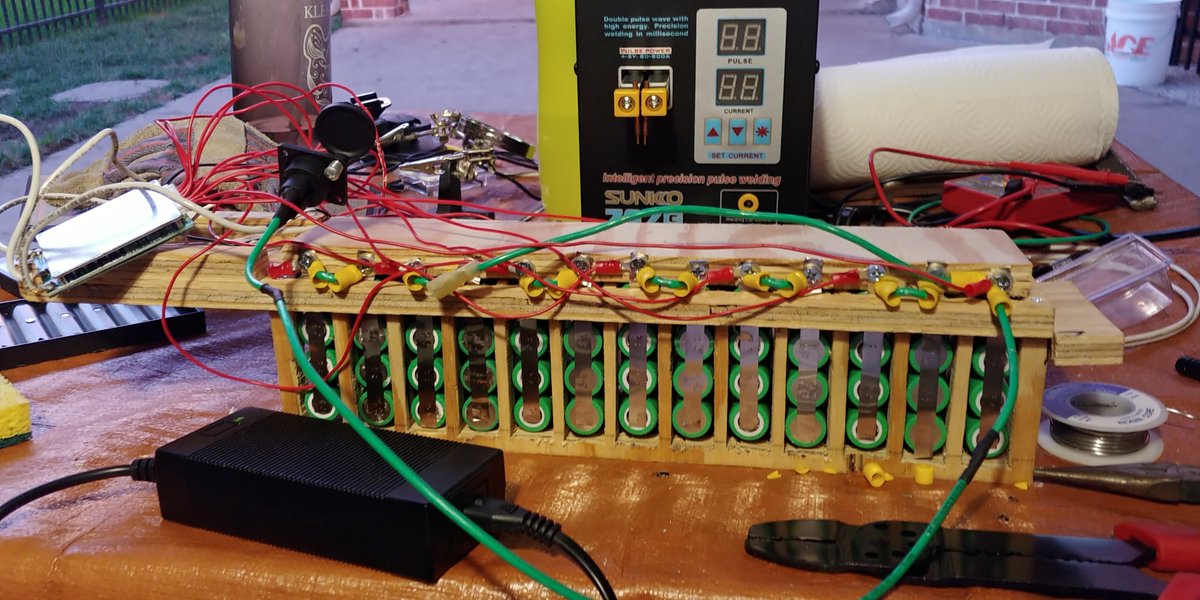 Kaelinator17's tweet photo. My high-airflow + removable battery pack is now complete! Featuring:
- Poor cable management
- A chipping plywood construction
What do you think? @elonmusk https://t.co/ZTLxX5icxn