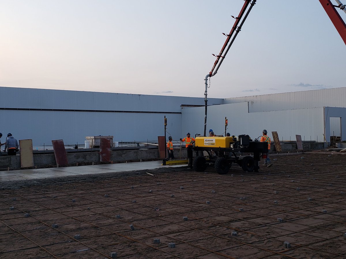 WinklerConcrete's tweet photo. An awesome day to laser screed some concrete for @kenwaldner75  and @jeharms7  and their crew @constructionkj  at the Fairholme Hutterite Colony! The progress these guys have made this summer is amazing! #customlaserscreed #hogbarn #winklerconcrete #ligchine #concreteworkshard https://t.co/4QZuRsVJq7