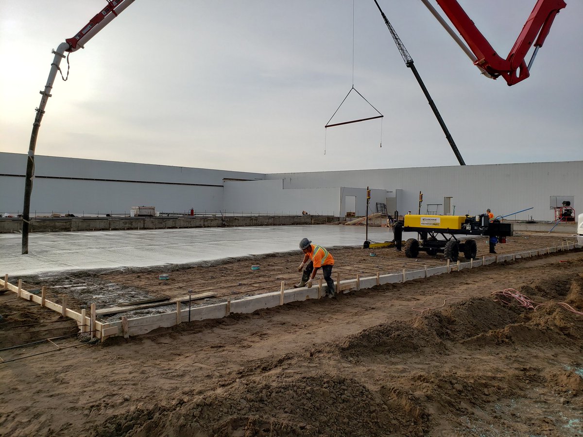 WinklerConcrete's tweet photo. An awesome day to laser screed some concrete for @kenwaldner75  and @jeharms7  and their crew @constructionkj  at the Fairholme Hutterite Colony! The progress these guys have made this summer is amazing! #customlaserscreed #hogbarn #winklerconcrete #ligchine #concreteworkshard https://t.co/4QZuRsVJq7