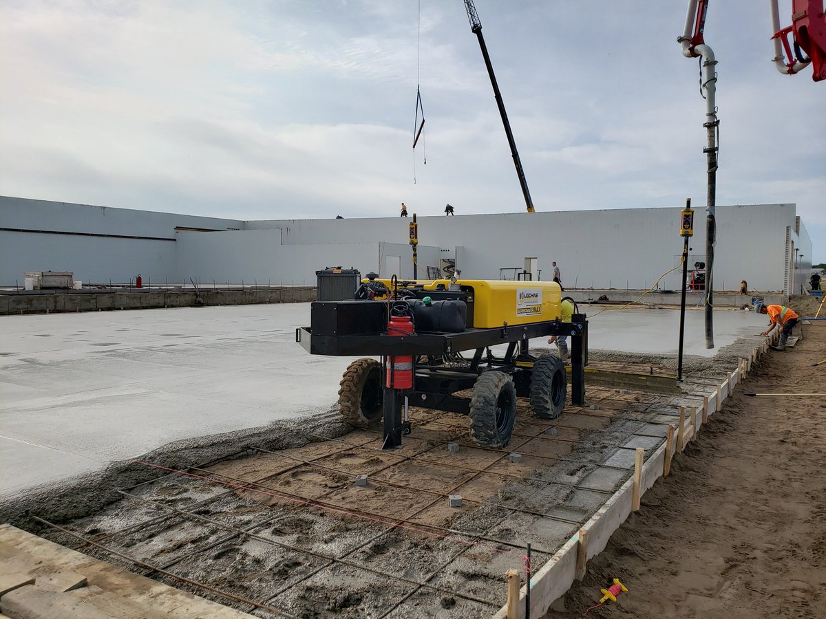 WinklerConcrete's tweet photo. An awesome day to laser screed some concrete for @kenwaldner75  and @jeharms7  and their crew @constructionkj  at the Fairholme Hutterite Colony! The progress these guys have made this summer is amazing! #customlaserscreed #hogbarn #winklerconcrete #ligchine #concreteworkshard https://t.co/4QZuRsVJq7