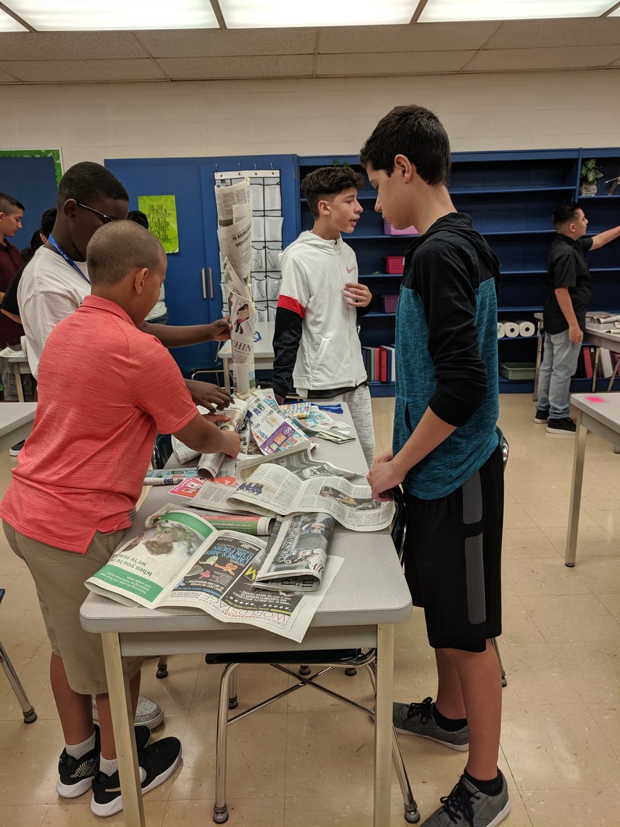 stratmanscience's tweet photo. Breaking the ice with home base in a friendly newspaper tower competition.  What a collaborative and creative group! #jjh68learns https://t.co/zlXyNQgENg