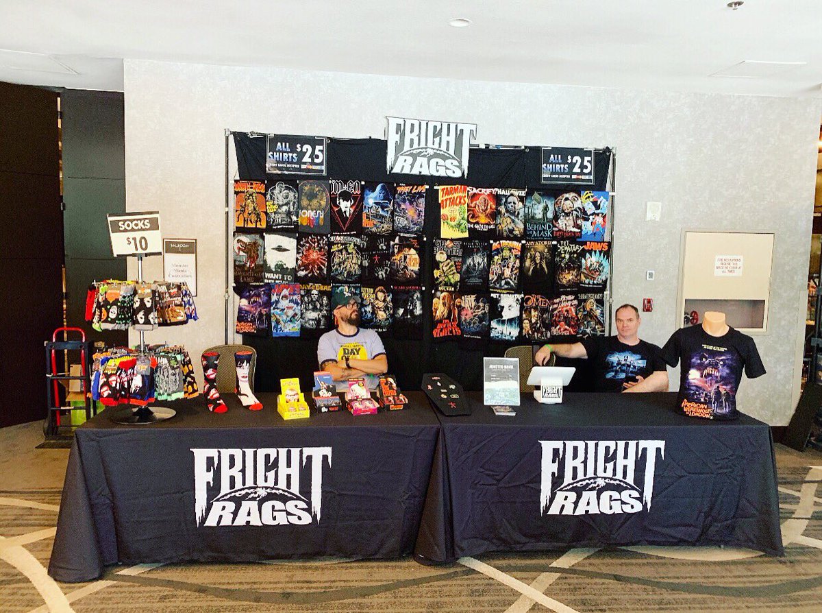 KimmyBlanks's tweet photo. Our @frightrags booth is set up and ready to roll for #MonsterMania Weekend! Make sure to stop by the table, say hi to the guys & check out our merch! #FrightRags #Horror #Convention #Tshirt #Tee #Style #HorrorMerch #EnamelPins #TradingCards #HorrorSocks #CherryHill #Halloween https://t.co/usxppgg0ZZ