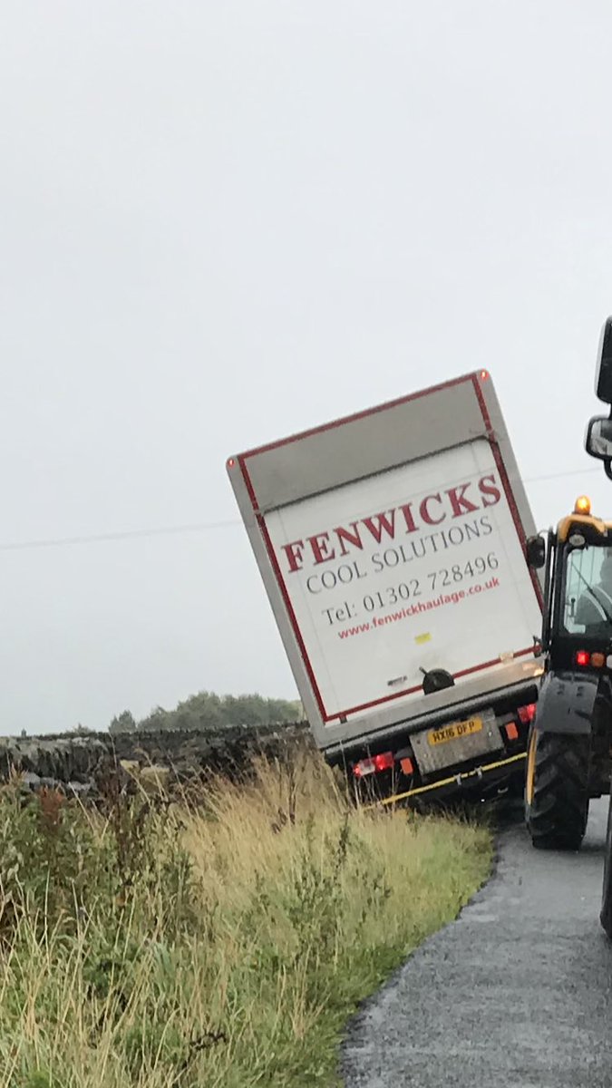 KC6610TINA's tweet photo. Please avoid Cowling Pinnacle area of Dick Lane until this lorry is recovered. Thankfully there were no injuries sustained. https://t.co/GBdCrx1uKk