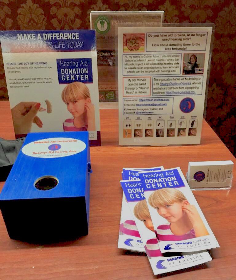 HearShomea's tweet photo. One of our donation boxes. This box is located at the Merrick Jewish Centre in Merrick NY.

#hearing #hearingaids #hearshomea #donation #hearingaidproject #hearingcharitiesofamerica #jewish https://t.co/bnkTrk324y