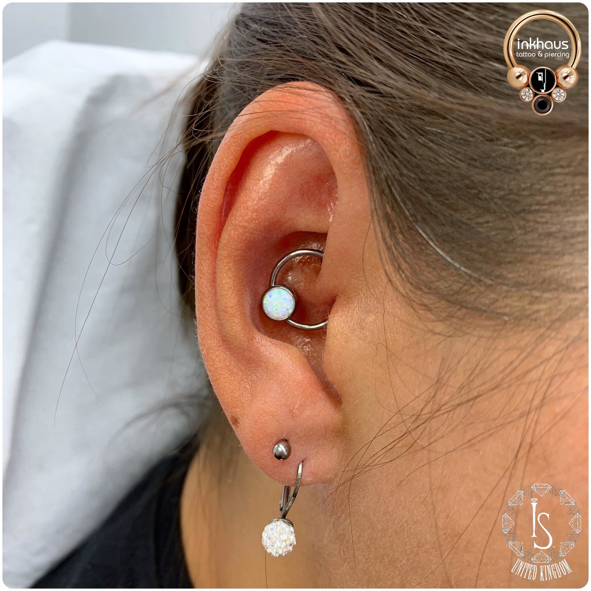I love white opals because they look like they’re filled with colourful confetti! 💖 Daith piercings are getting very popular again and I did this one today with a captive bead ring and stunning captive white opal from <a href="/ISbodyjewelry/">INDUSTRIAL STRENGTH</a>. #yarm #piercing