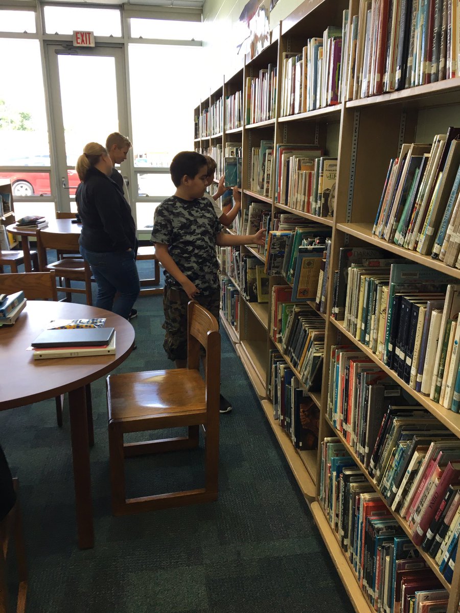 NR_KJones's tweet photo. We are excited to check out books at our *new* MS library! So many titles, so little time! @NRMiddleSchool #WeAreNR #bookworms https://t.co/Hj9qDkY9oD