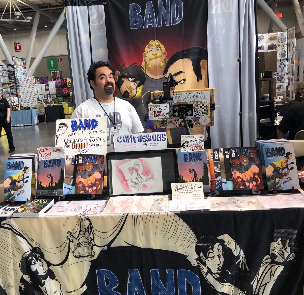 BANDcomic's tweet photo. Day one of #fanexpoboston2019 set and ready to go!  Find us in #artistalley at table A806!  

#fanexpoboston #comiccon #comicconvention #graphicnovel #graphicnovels https://t.co/RvlTyE0Zgq