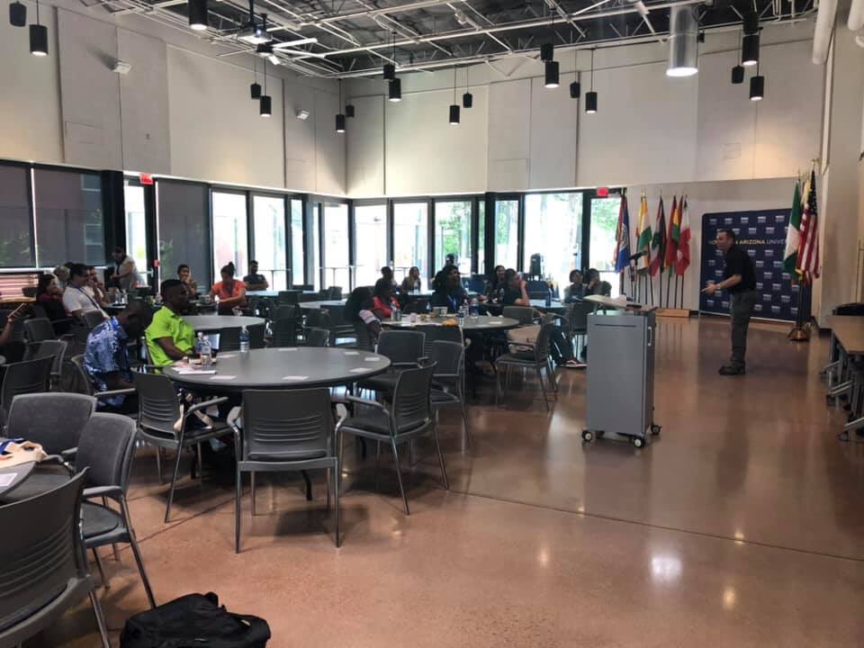 NAUPolice's tweet photo. NAUPD Sgt Tritschler and Officer Rintala joined the Graduate International Students at orientation today to talk about campus safety. Welcome to NAU! 🚔#NAUPD https://t.co/mHy6oeTYQX