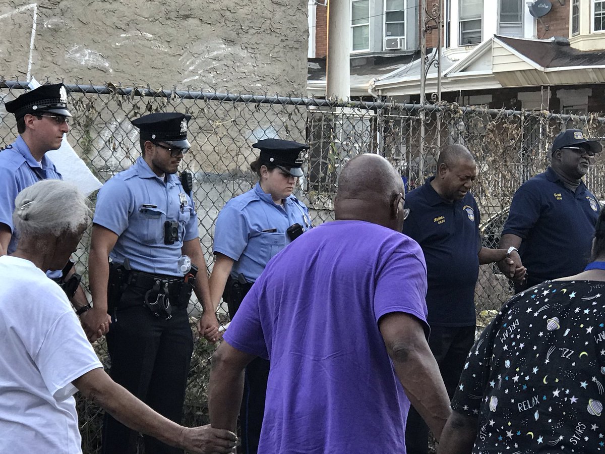 PPD19Dist's tweet photo. Last night’s meeting was closed out by a powerful prayer for peace by the Police Clergy. Such a powerful moment! #19thCommunityPride #ThePHLWay #PrayForPeace https://t.co/VbebsmoiQE