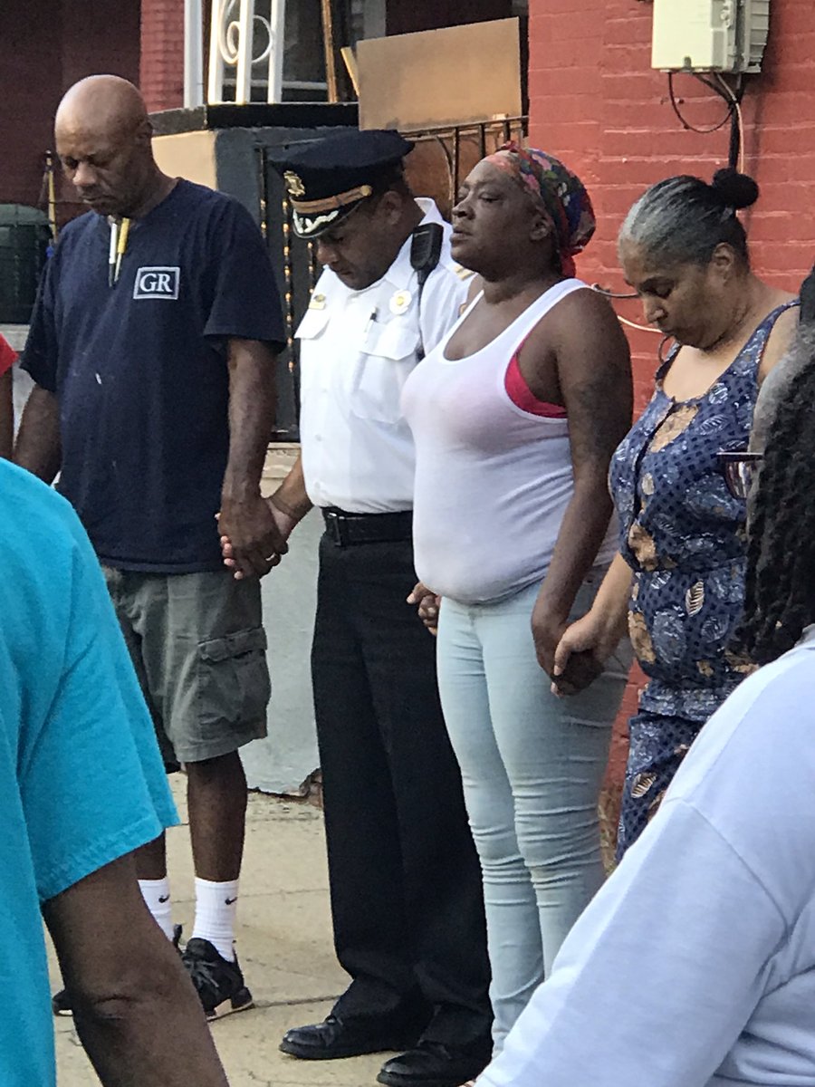 PPD19Dist's tweet photo. Last night’s meeting was closed out by a powerful prayer for peace by the Police Clergy. Such a powerful moment! #19thCommunityPride #ThePHLWay #PrayForPeace https://t.co/VbebsmoiQE