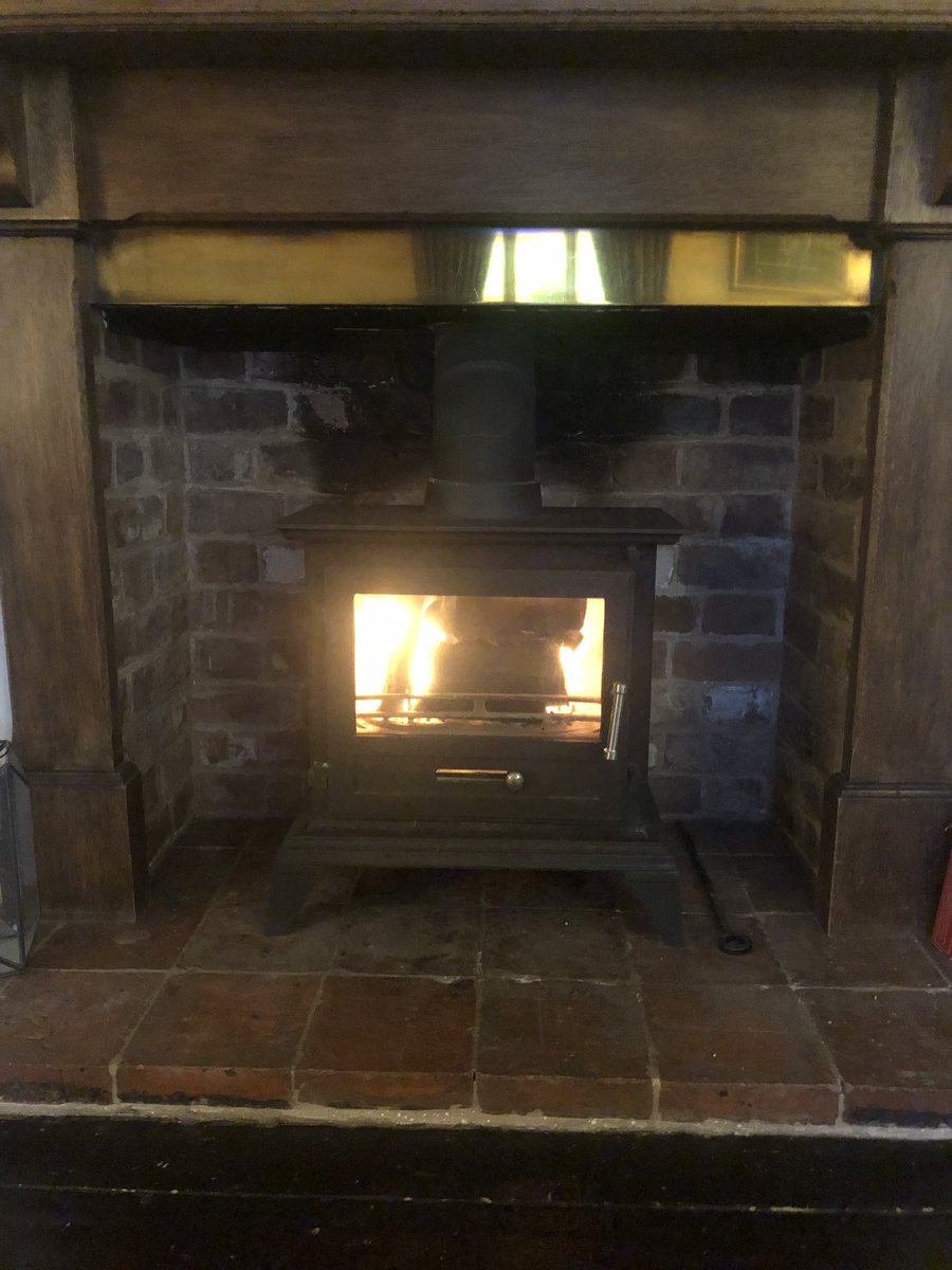 bakerwill1's tweet photo. It’s the middle of August and we have lit the fire #likewinter #rain #harvest2019 https://t.co/GUSS8M4mo0