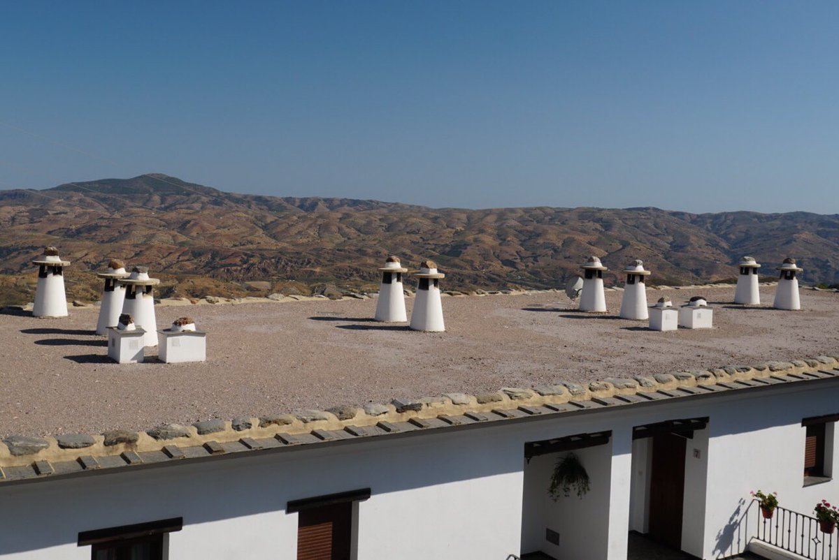 Chimneys Alpujarra style.  Just add ponchos to complete the Mexican look 🙂🌵

#property #buildings #architecture #alpujarra #granada #spain #chimneys #roofs